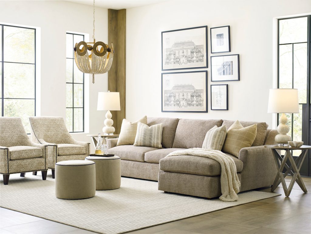 living room with sectional and chairs