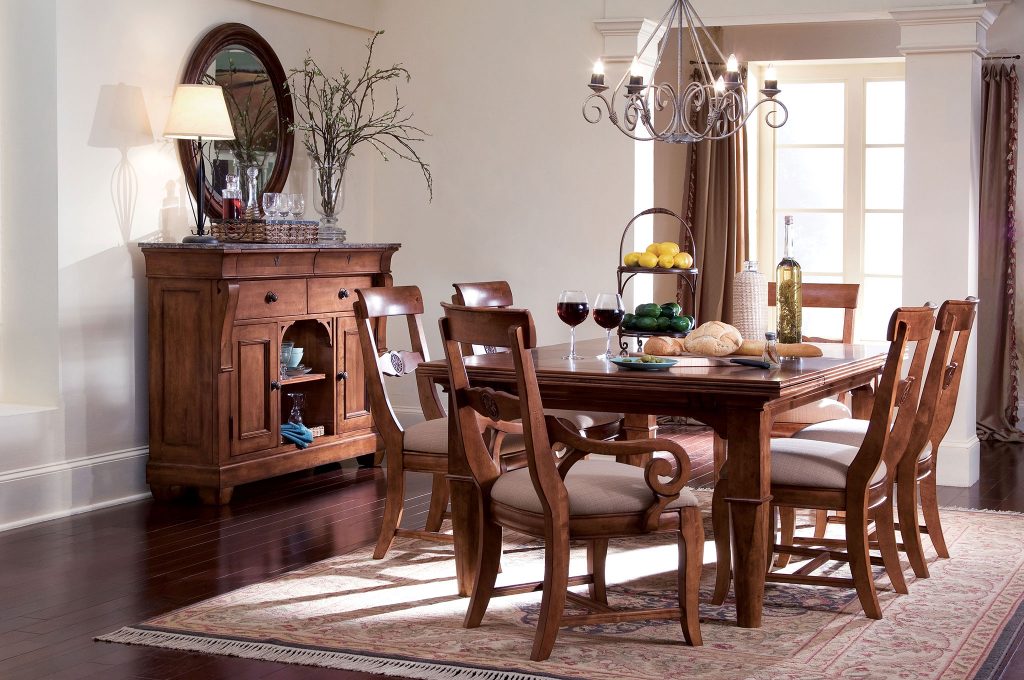 Add a classic and casual style to your Chattanooga dining room with the Tuscano dining room table and chairs set from Kincaid.