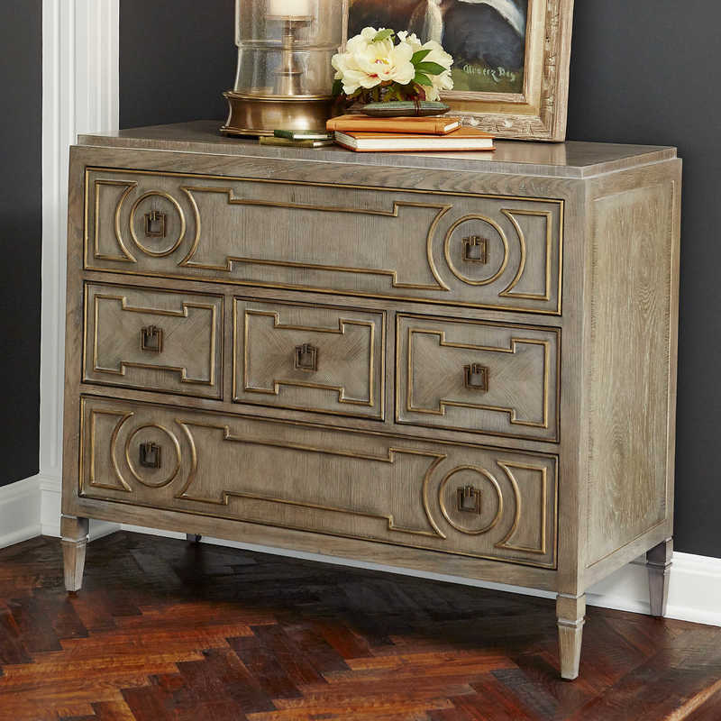 Add interest to your Chattanoga bedroom with a piece like this Handley from Uttermost, boasting eye-catching details, texture, and a light wood stain.