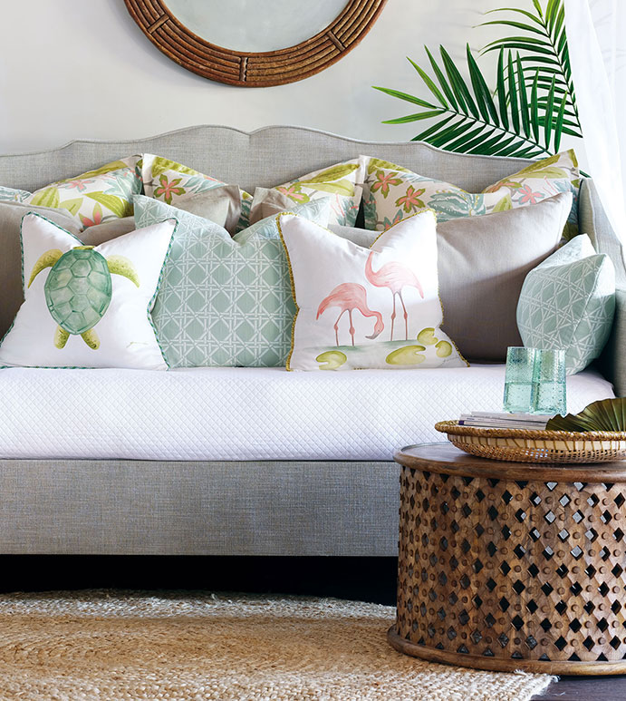 Add a splash of summer to your Chattanooga interior design efforts with tropical prints and pops of color with items like these Eastern Accents throw pillows.