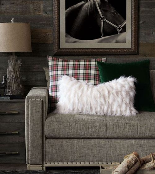 This plaid pillow accent piece provides a cozy holiday vibe