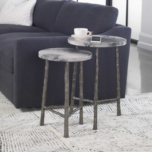 grey round accent decor side tables that add texture.