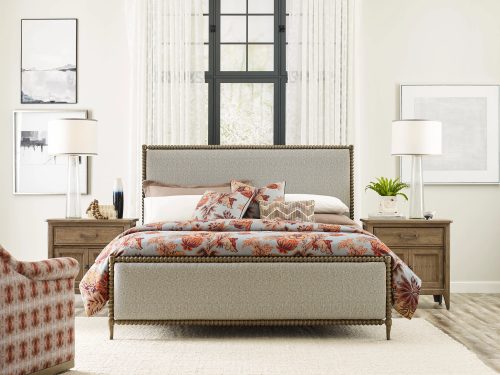 traditional furniture bed set with floral comforter.