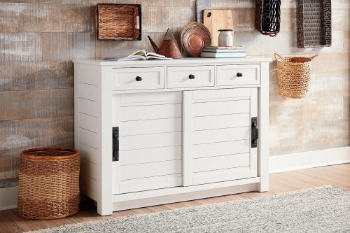 white shiplap cabinet for maximum room storage.