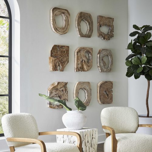Decorating with white can be done with chairs from Uttermost.