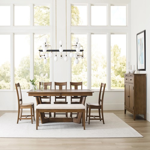 The Rectangular Trestle Table by Kincaid can create a casual dining room feel.