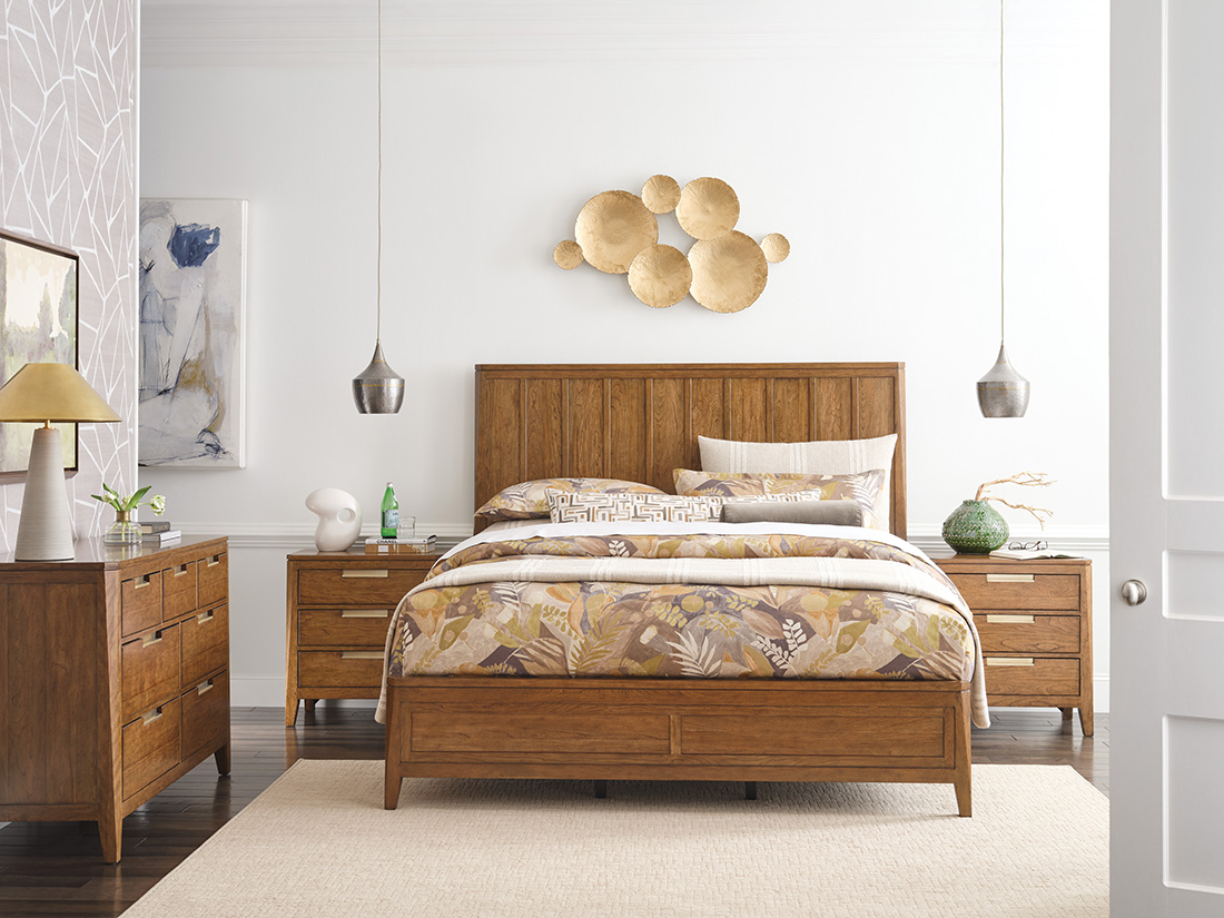 Timeless furniture bedroom set featuring a solid wood panel bed with matching nightstands and dresser, styled in a warm, classic design.